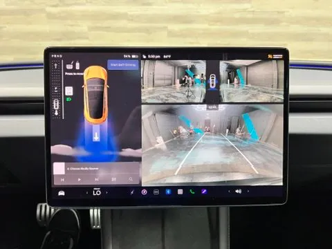 Tesla Model 3 photo 12