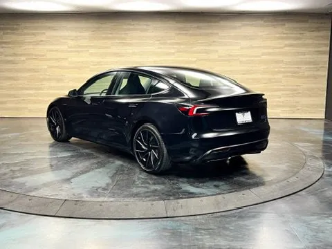 Tesla Model 3 photo 11