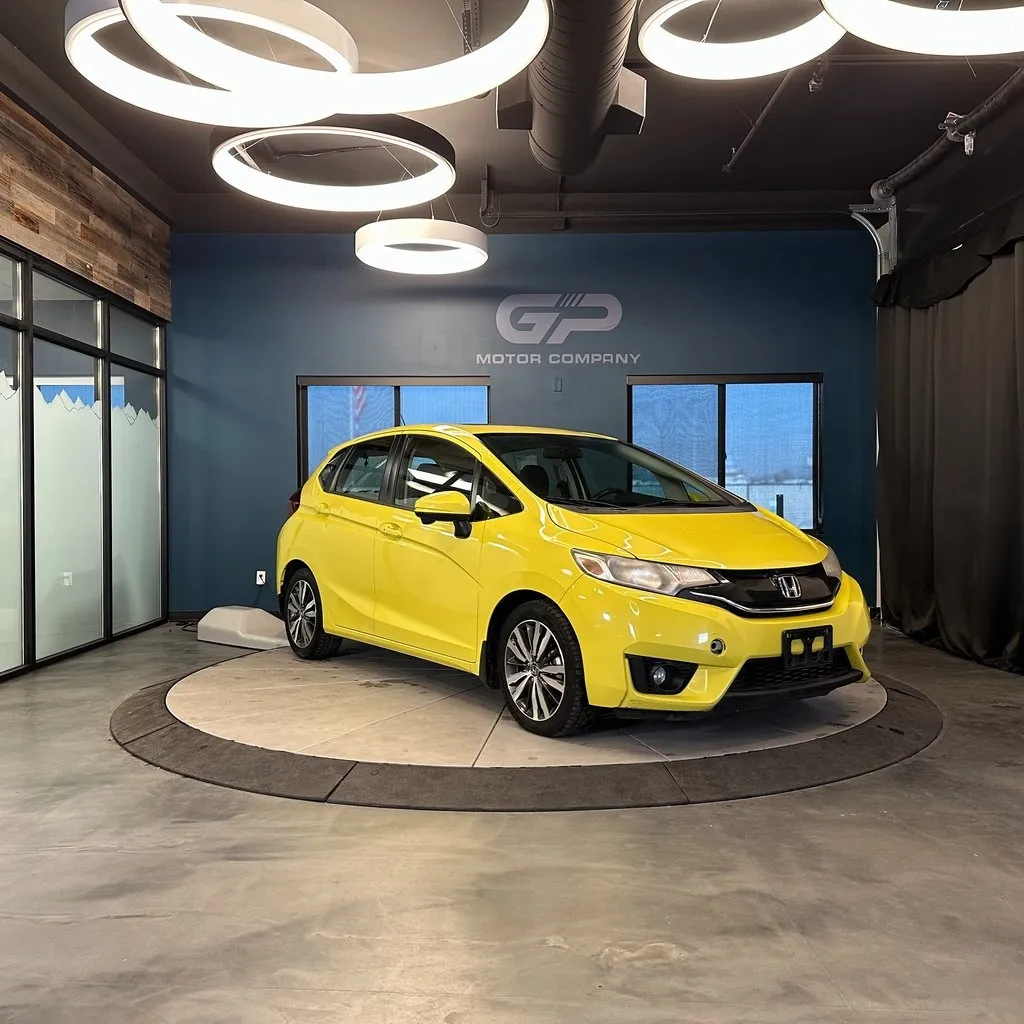 Yellow 2016 Honda Fit EX for sale in Kaysville, UT