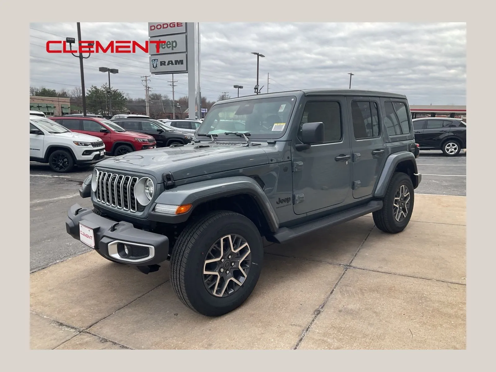 Gray 2026 Jeep Wrangler Sahara for sale in Florissant, MO