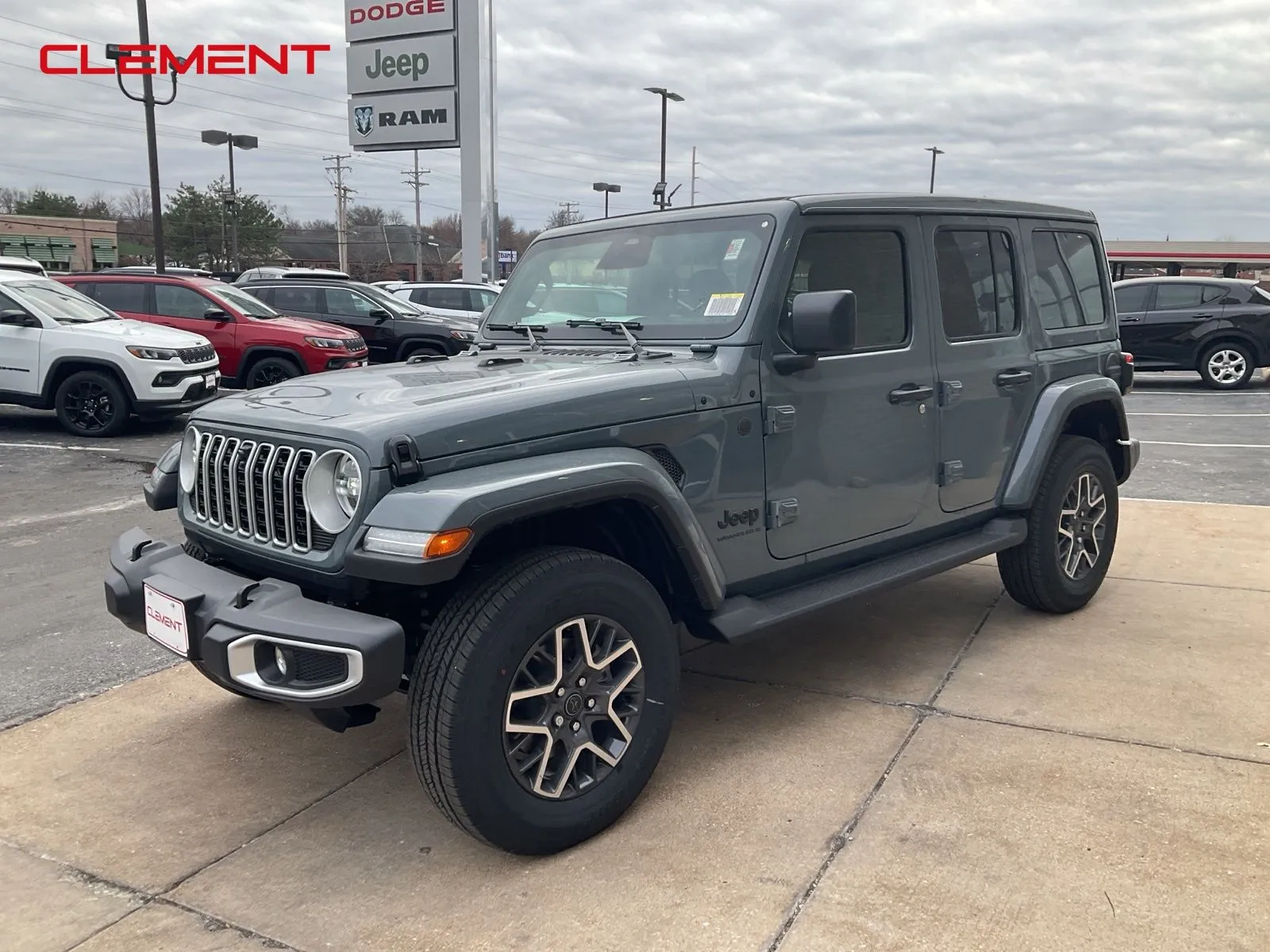 Gray 2026 Jeep Wrangler Sahara for sale in Florissant, MO