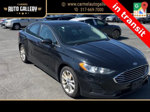 Black 2020 Ford Fusion Hybrid SE for sale in Carmel, IN