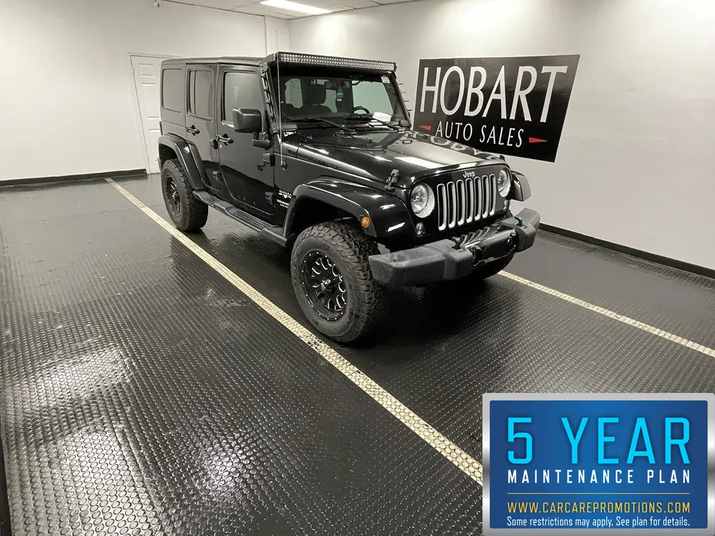 Black 2016 Jeep Wrangler Unlimited Sahara for sale in Hobart, IN