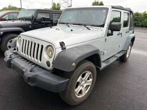 Silver 2010 Jeep Wrangler Unlimited Sport for sale in Grove City, OH