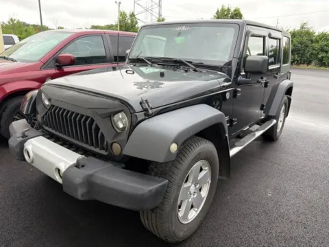 Black 2009 Jeep Wrangler Unlimited Sahara for sale in Grove City, OH
