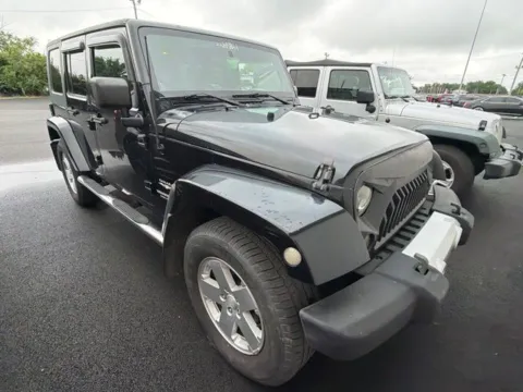 Another view of 2009 Jeep Wrangler Unlimited Sahara for sale in Grove City, OH at Funky's Automotive - A division of ETC Auto Group