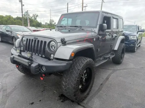 Another view of 2016 Jeep Wrangler Unlimited Sahara for sale in Grove City, OH at Funky's Automotive - A division of ETC Auto Group
