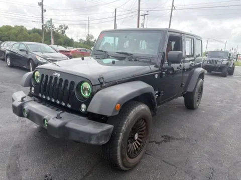 Another view of 2015 Jeep Wrangler Unlimited Sport for sale in Grove City, OH at Funky's Automotive - A division of ETC Auto Group