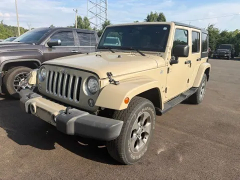 Beige 2017 Jeep Wrangler Unlimited Sahara for sale in Grove City, OH
