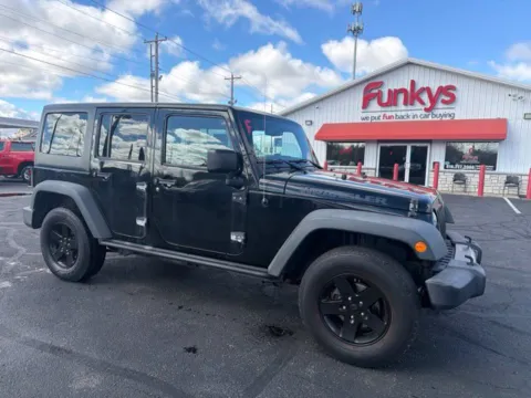 Black 2016 Jeep Wrangler Unlimited Sport for sale in Grove City, OH