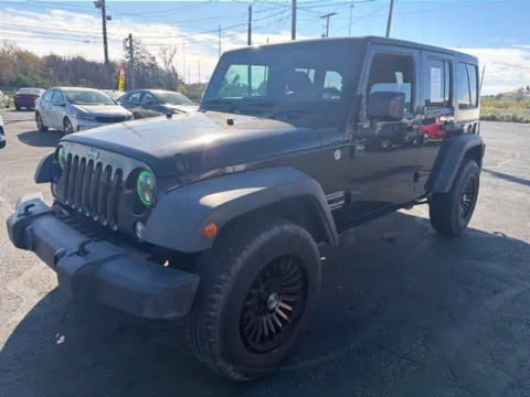Another view of 2015 Jeep Wrangler Unlimited Sport for sale in Grove City, OH at Funky's Automotive - A division of ETC Auto Group