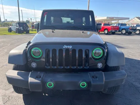 Photos of 2015 Jeep Wrangler Unlimited Sport for sale in Grove City, OH at Funky's Automotive - A division of ETC Auto Group
