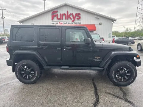 Photos of 2013 Jeep Wrangler Unlimited Sahara for sale in Grove City, OH at Funky's Automotive - A division of ETC Auto Group