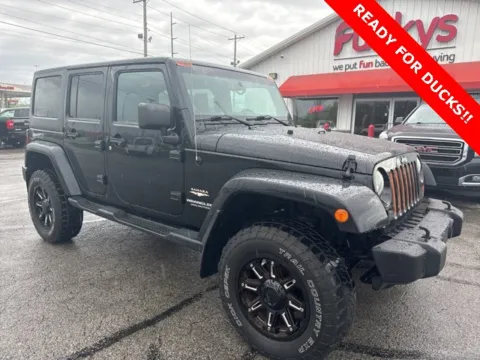 Black 2013 Jeep Wrangler Unlimited Sahara for sale in Grove City, OH