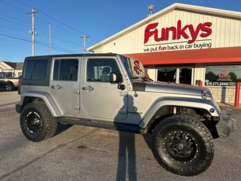 Silver 2016 Jeep Wrangler Unlimited Sahara for sale in Grove City, OH