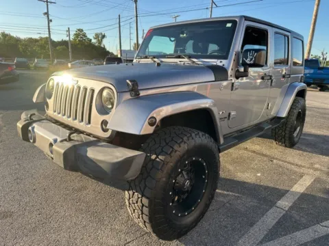 Another view of 2016 Jeep Wrangler Unlimited Sahara for sale in Grove City, OH at Funky's Automotive - A division of ETC Auto Group
