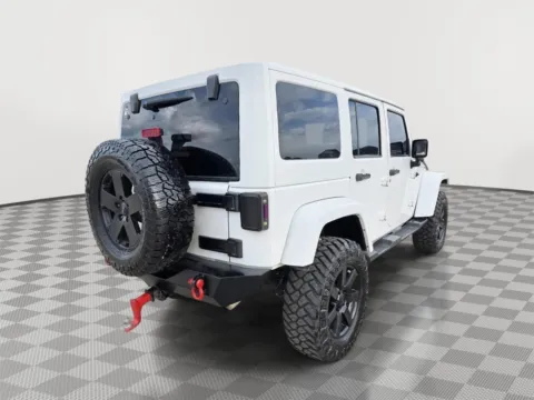 More photos of 2013 Jeep Wrangler Unlimited Sahara at Driven, ID