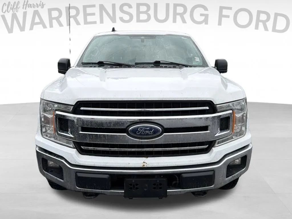 Used 2019 Ford F-150 XLT with VIN 1FTFW1E58KKD77699 for sale in Kansas City