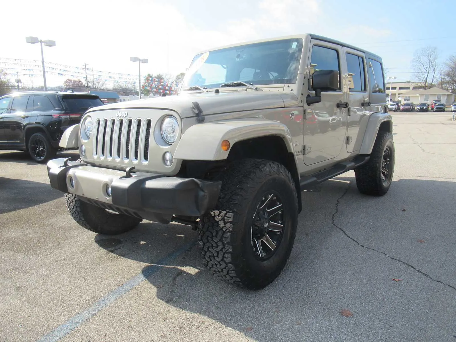 Beige 2017 Jeep Wrangler Unlimited Sahara for sale in Jefferson City, TN