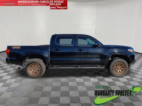 Photos of 2023 Toyota Tacoma SR for sale in Warrensburg, MO at Warrensburg Chrysler Dodge Jeep Ram Fiat