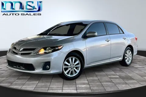 Silver 2011 Toyota Corolla CE for sale in Jacksonville, FL