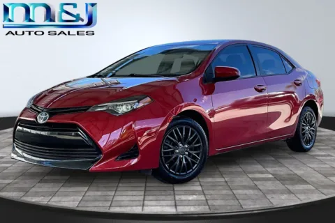 Red 2017 Toyota Corolla CE for sale in Jacksonville, FL