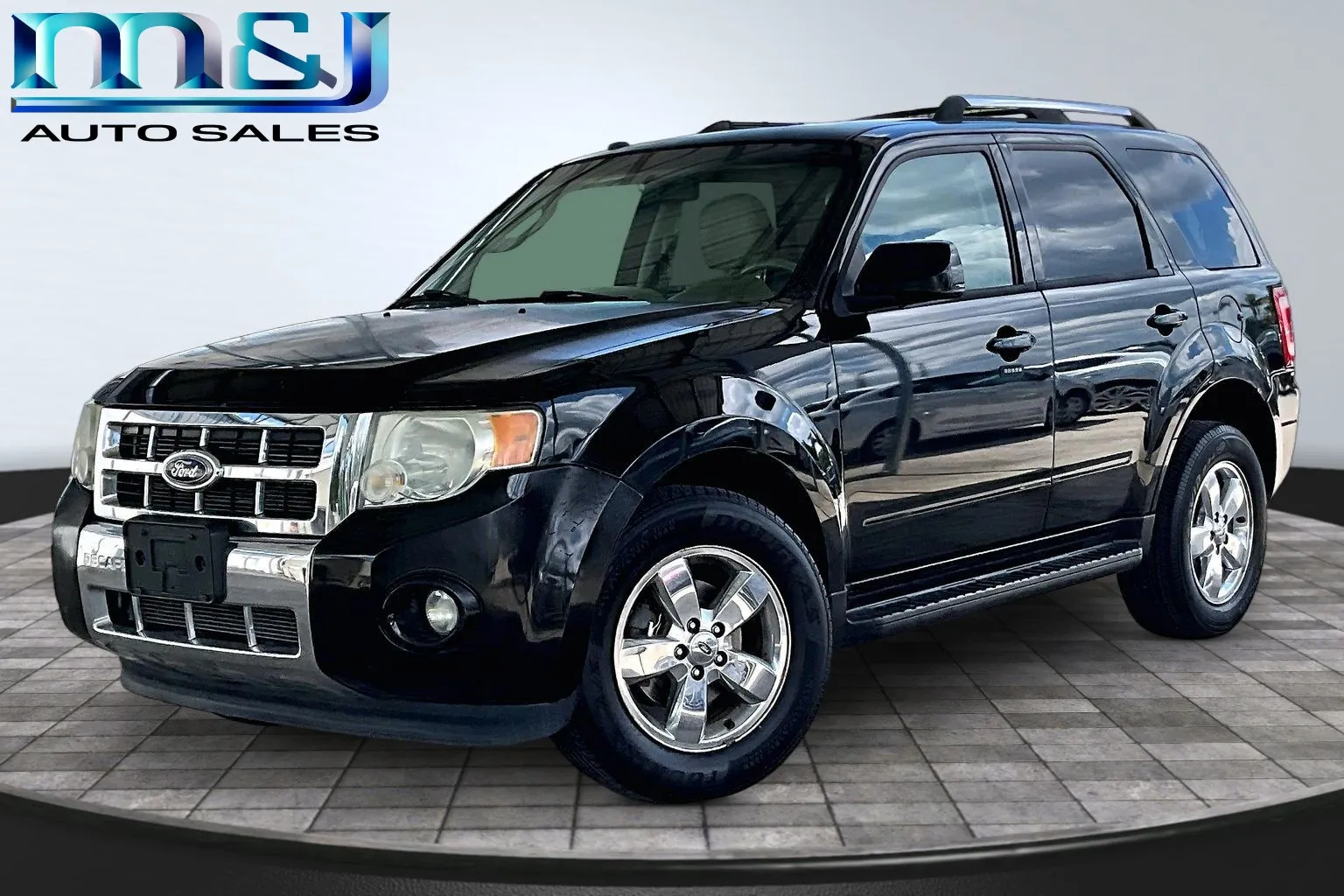 2010 Ford Escape Limited 4WD's photo