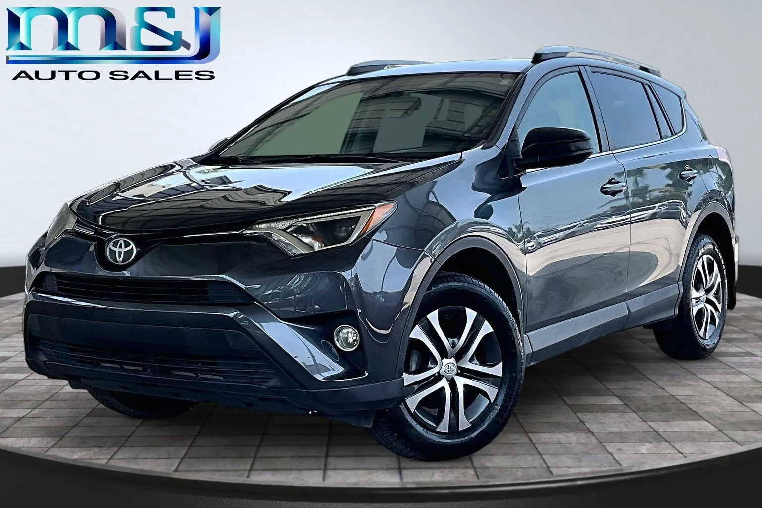 Gray 2017 Toyota RAV4 LE for sale in Jacksonville, FL
