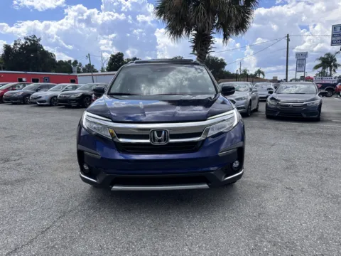 Photos of 2022 Honda Pilot Touring for sale in Jacksonville, FL at M&J Auto Sales and Service