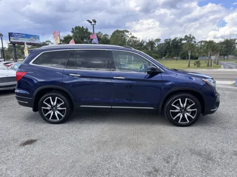 More photos of 2022 Honda Pilot Touring at M&J Auto Sales and Service, FL