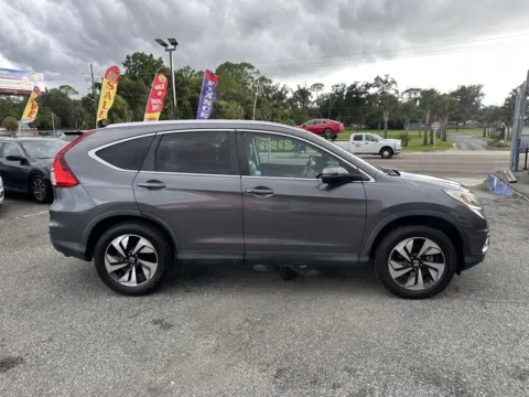 More photos of 2015 Honda CR-V Touring at M&J Auto Sales and Service, FL