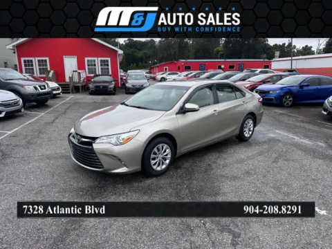 Gold 2017 Toyota Camry for sale in Jacksonville, FL