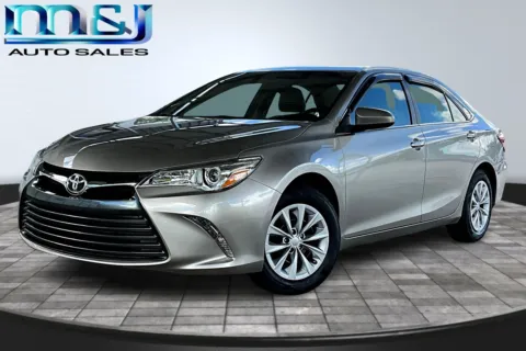Gold 2017 Toyota Camry for sale in Jacksonville, FL