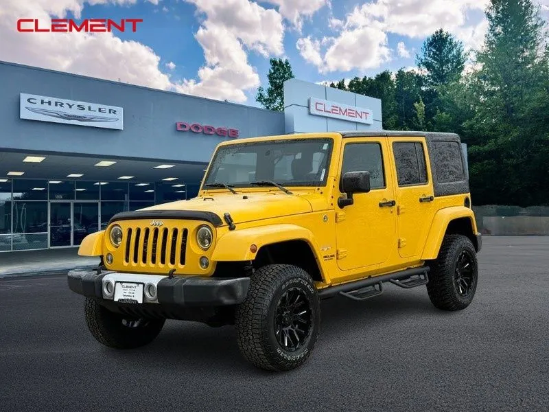 Yellow 2015 Jeep Wrangler Unlimited Sahara for sale in Columbia, IL