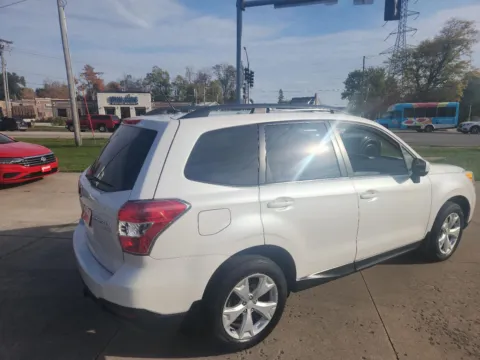 Another view of 2014 Subaru Forester 2.5i Premium for sale in Marion, IA at Houdek Auto Center