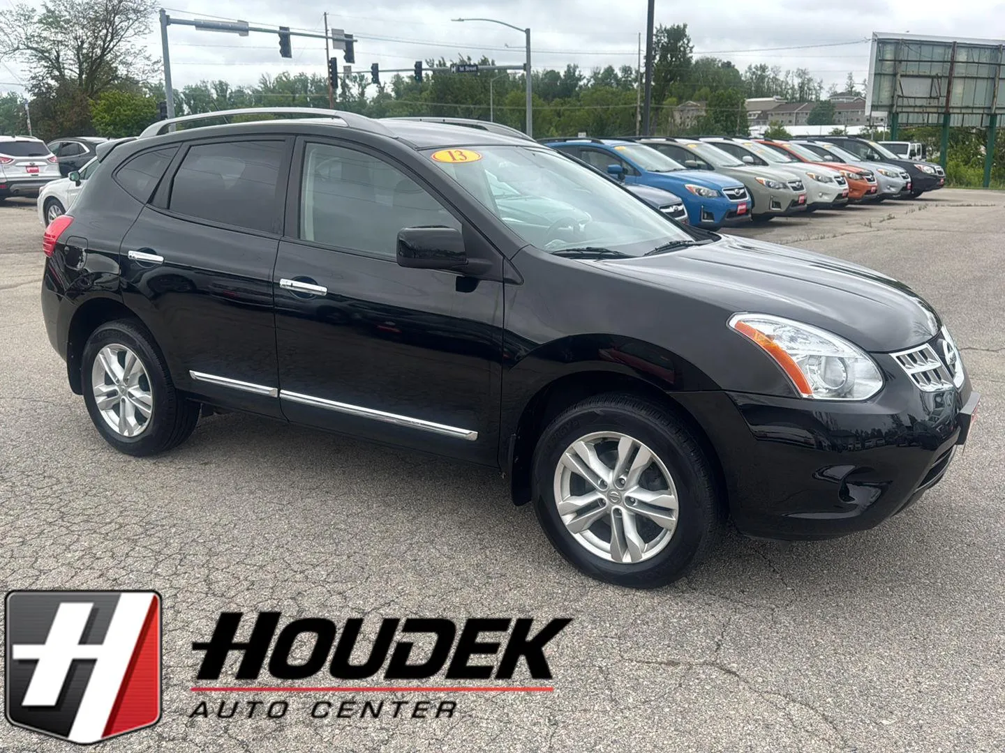 Black 2013 Nissan Rogue SV for sale in Marion, IA