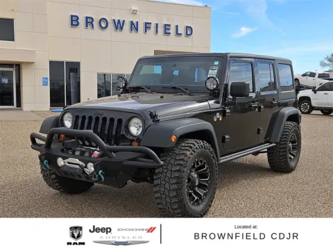 Black 2013 Jeep Wrangler Unlimited Sport for sale in Brownfield, TX