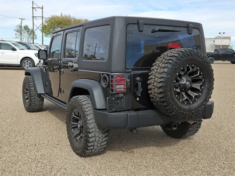 Another view of 2013 Jeep Wrangler Unlimited Sport for sale in Brownfield, TX at Brownfield CDJR