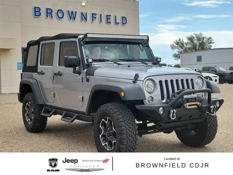 Silver 2017 Jeep Wrangler Unlimited Sport for sale in Brownfield, TX
