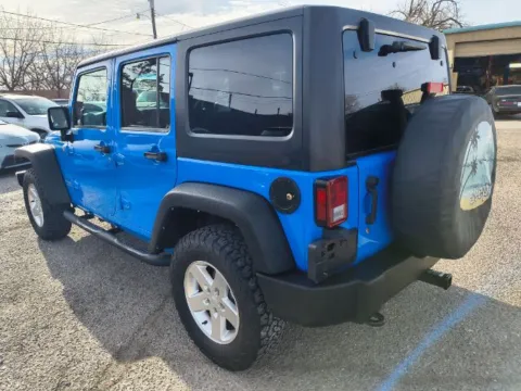 Another view of 2011 Jeep Wrangler Unlimited Sport for sale in Albuquerque, NM at Access Auto LLC