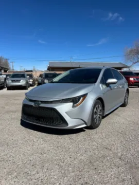 Silver 2021 Toyota Corolla Hybrid LE for sale in Albuquerque, NM