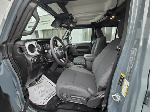 Photos of 2026 Jeep Wrangler Sport S for sale in Sodus, NY at Peake Chrysler Dodge Jeep Ram Fiat