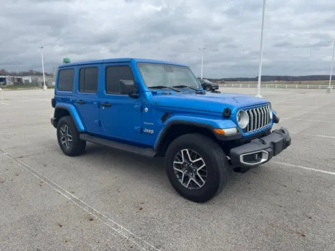 Gray 2024 Jeep Wrangler Sahara for sale in Carroll, OH
