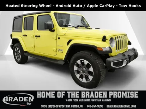 Yellow 2023 Jeep Wrangler Sahara for sale in Carroll, OH