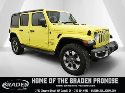 Yellow 2023 Jeep Wrangler Sahara for sale in Carroll, OH
