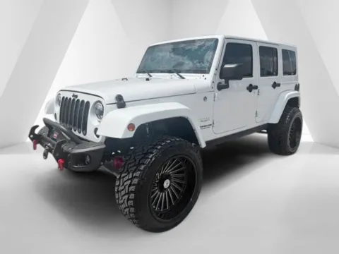 Another view of 2015 Jeep Wrangler Unlimited Sahara for sale in Carroll, OH at Braden Cadillac GMC