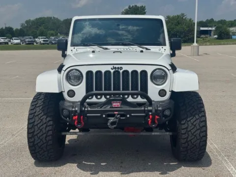 Photos of 2015 Jeep Wrangler Unlimited Sahara for sale in Carroll, OH at Braden Cadillac GMC