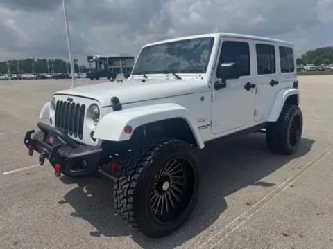 Another view of 2015 Jeep Wrangler Unlimited Sahara for sale in Carroll, OH at Braden Cadillac GMC
