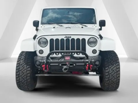 Photos of 2015 Jeep Wrangler Unlimited Sahara for sale in Carroll, OH at Braden Cadillac GMC