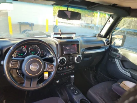Photos of 2014 Jeep Wrangler Unlimited Sahara for sale in Jacksonville, FL at AUTOLAND